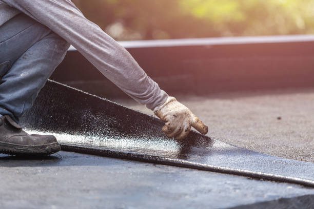 Professional Basement Waterproofing technician working in Marion, WI